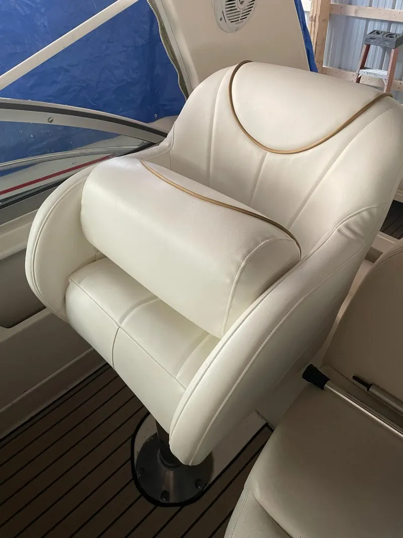 Slide: The Image of Luxury white captain's chair on 2000 Sea Ray 340 Sundancer boat. - 8