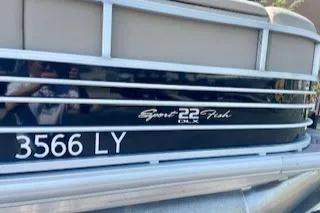 Slide: The Image of 2023 Sun Tracker SportFish 22 DLX pontoon boat with registration number 3566 LY. - 5