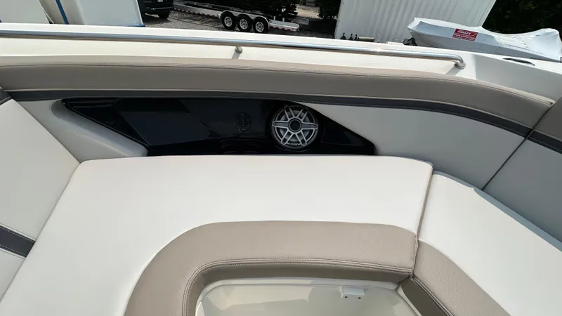 Slide: The Image of 2025 Boston Whaler 330 Vantage interior seating with speaker detail. - 36