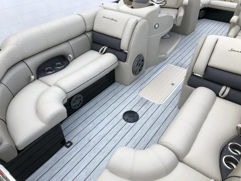Slide: The Image of Luxurious interior of 2018 South Bay 25 Sport CR9 pontoon boat with plush seating. - 22