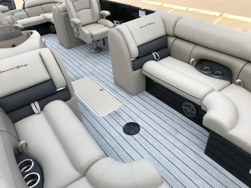 Slide: The Image of Luxurious interior of 2018 South Bay 25 Sport CR9 pontoon boat with plush seating. - 23