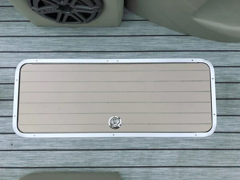 Slide: The Image of Deck hatch on 2018 South Bay 25 Sport CR9 boat with speaker detail. - 37