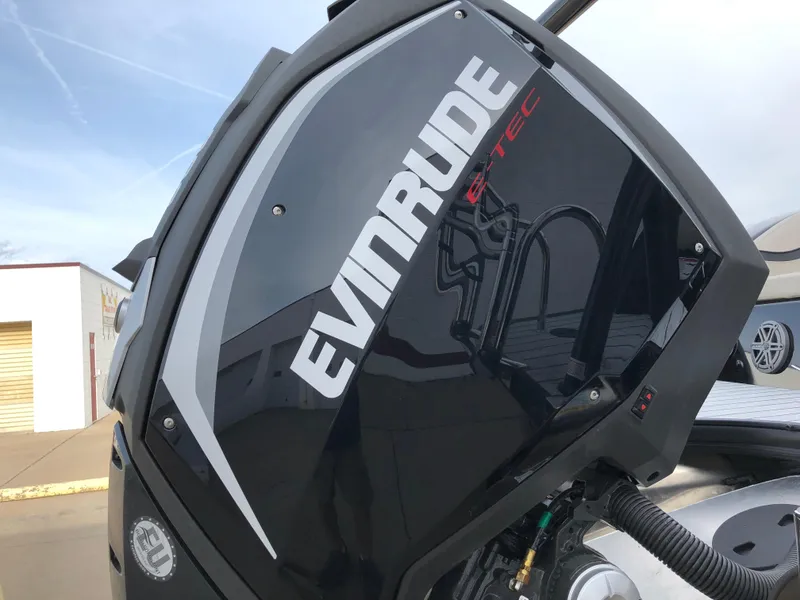 Slide: The Image of Evinrude outboard motor on 2018 South Bay 25 Sport CR9 boat, close-up view. - 43