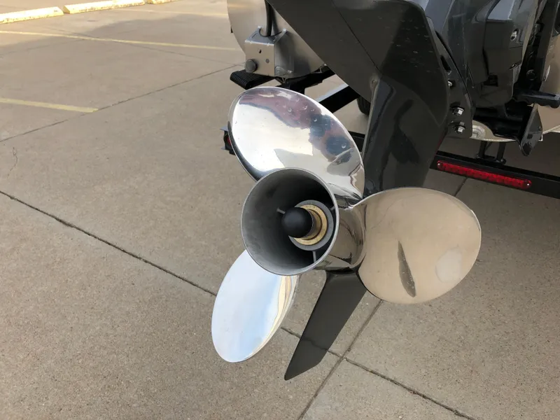 Slide: The Image of 2018 South Bay 25 Sport CR9 boat propeller on pavement background. - 44