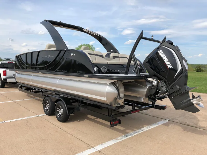 Slide: The Image of 2018 South Bay 25 Sport CR9 pontoon boat with Evinrude outboard motor on trailer. - 9