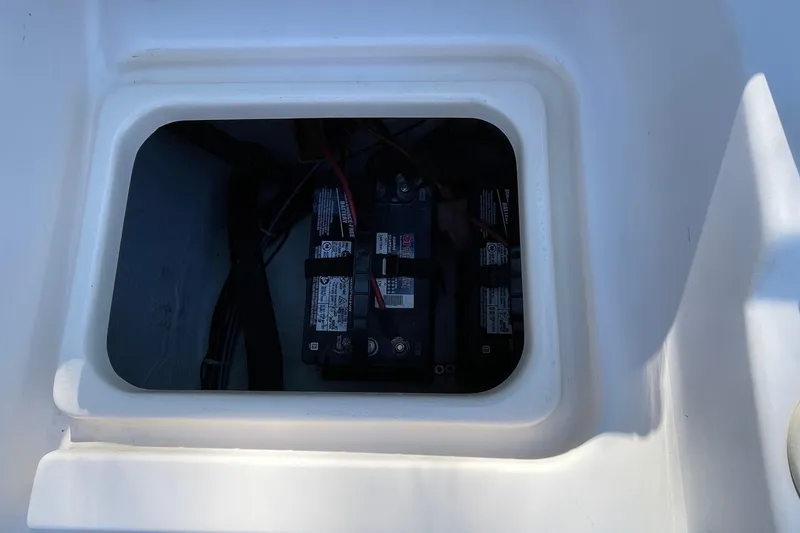Slide: The Image of Battery compartment of 1999 Grady-White 209 ESCAPE boat, showing installed batteries. - 17