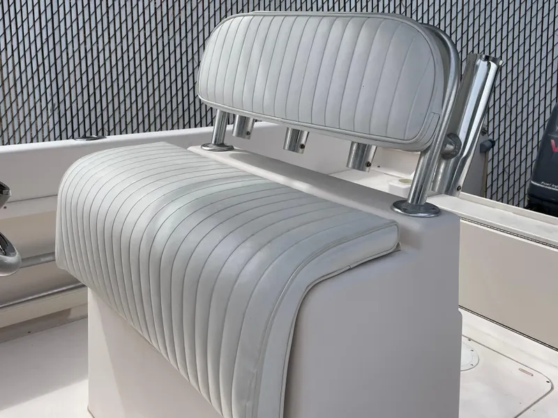 Slide: The Image of 1999 Grady-White 209 ESCAPE boat seat with white cushioned upholstery. - 7