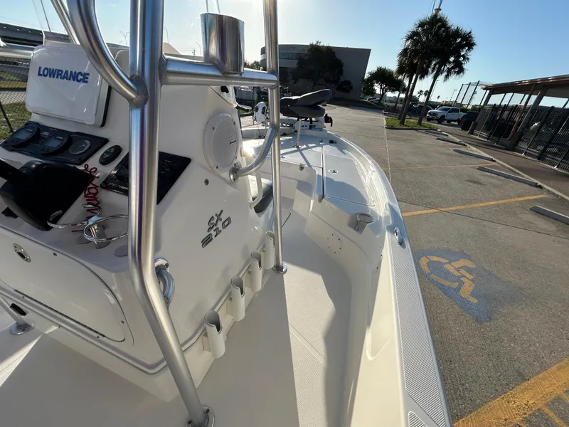 Slide: The Image of 2016 Skeeter SX 210 boat with Lowrance electronics, parked near a handicap space. - 11