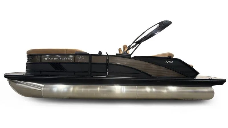 Slide: The Image of 2025 Bennington 22MSB-SPS pontoon boat, sleek design, side view, black and silver finish. - 1