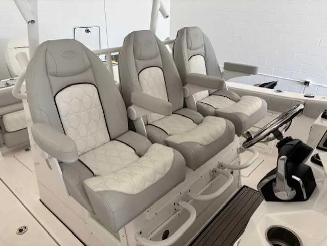Slide: The Image of 2023 Sea Fox 328 Commander boat seats, featuring luxurious gray and white upholstery. - 8