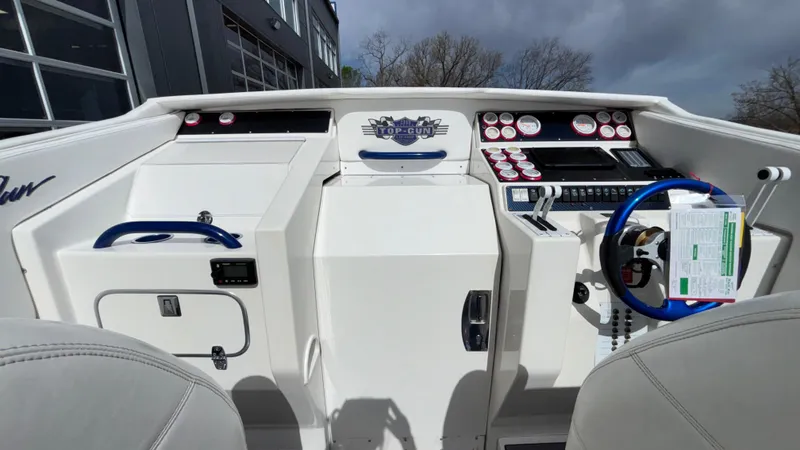 Slide: The Image of 1993 Cigarette 38 Top Gun boat dashboard with gauges and controls. - 15
