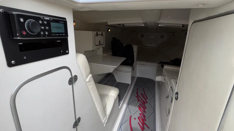 Slide: The Image of Interior of 1993 Cigarette 38 Top Gun boat with seating and audio system. - 31