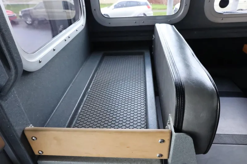 Slide: The Image of Interior seating of 2015 Duckworth 26 Offshore boat with textured flooring. - 29