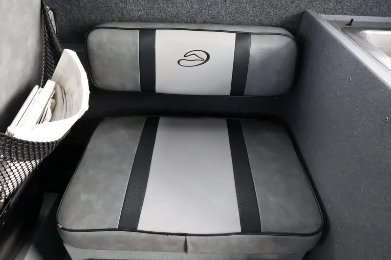Slide: The Image of 2015 Duckworth 26 Offshore boat interior seat with storage pocket. - 31