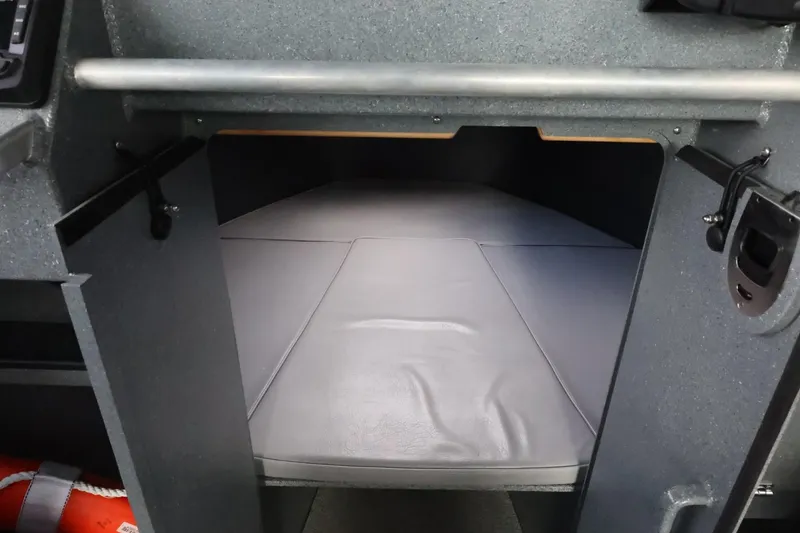 Slide: The Image of 2015 Duckworth 26 Offshore cabin interior with cushioned sleeping area. - 37