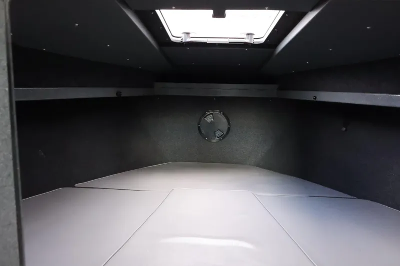 Slide: The Image of 2015 Duckworth 26 Offshore cabin interior with overhead hatch and sleek design. - 38