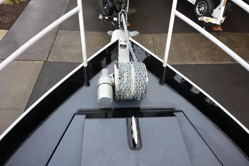 Slide: The Image of Bow of 2015 Duckworth 26 Offshore boat with anchor chain and winch. - 47