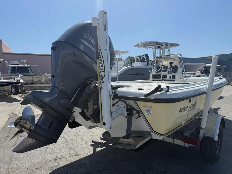 Slide: The Image of 2003 Action Craft 1820 boat with Yamaha outboard motor on trailer. - 6