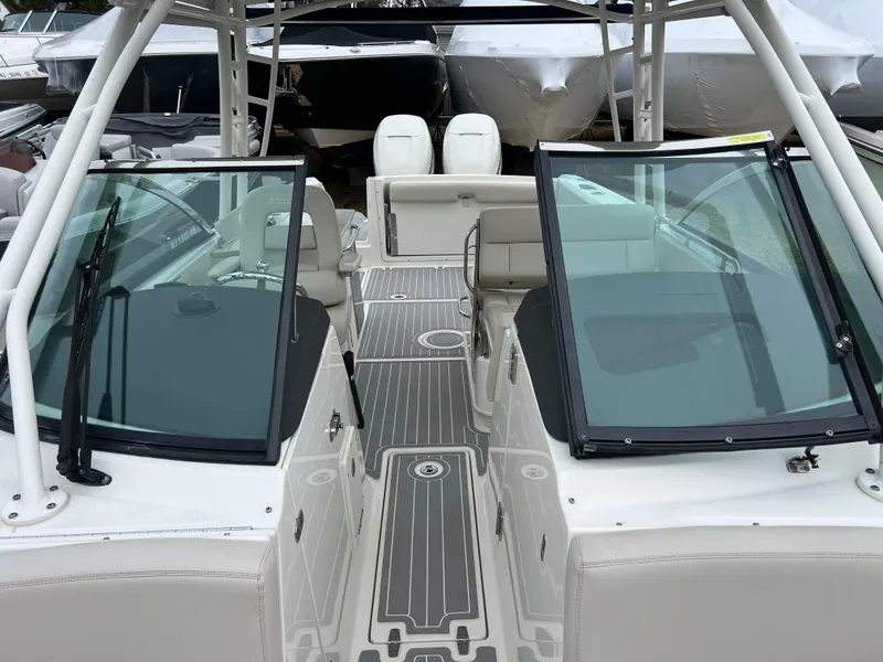 Slide: The Image of 2018 Boston Whaler 270 Vantage boat interior with dual consoles and seating. - 30