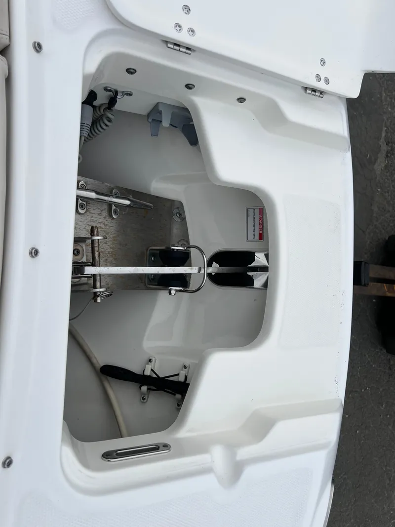 Slide: The Image of 2018 Boston Whaler 270 Vantage anchor compartment, showcasing storage and equipment. - 38