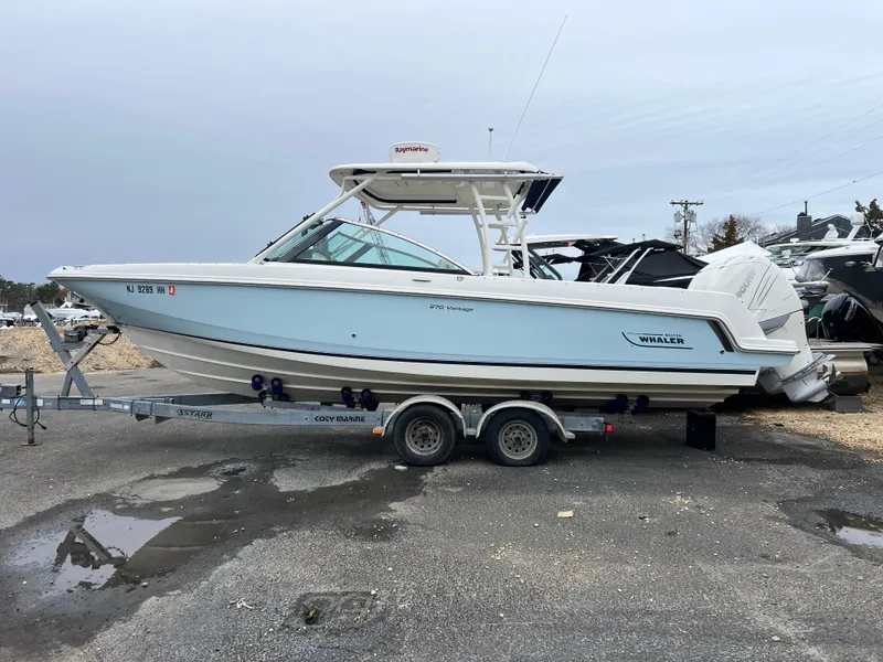 Slide: The Image of 2018 Boston Whaler 270 Vantage boat on trailer, side view. - 8