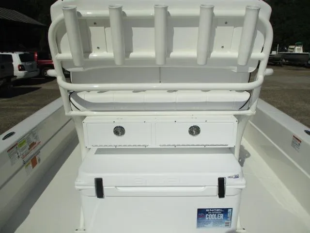 Slide: The Image of 2025 Skeeter SX241 boat interior with rod holders and Engel cooler. - 4