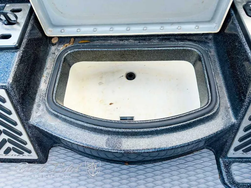Slide: The Image of Open storage compartment in 2023 Caymas CX 20 PRO boat. - 17