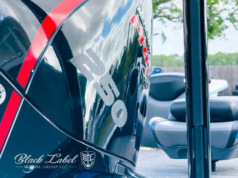 Slide: The Image of 2023 Caymas CX 20 PRO boat engine close-up with Black Label Marine Group logo. - 8