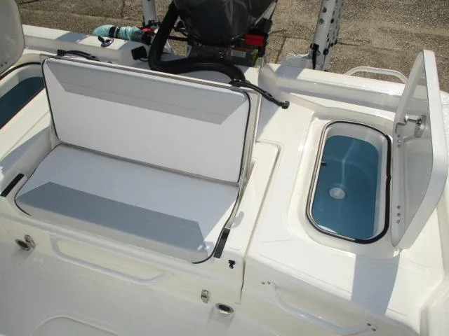 Slide: The Image of 2025 Skeeter SX241 boat interior with seating and storage compartments. - 14