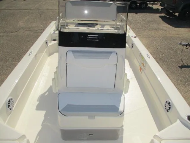 Slide: The Image of 2025 Skeeter SX241 boat interior with seating and console, showcasing spacious design. - 9