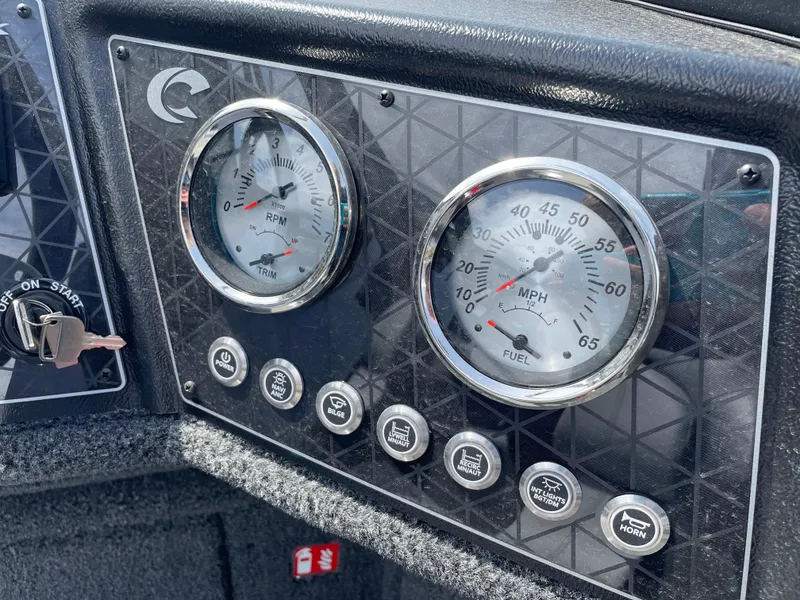 Slide: The Image of Dashboard of 2025 Crestliner 1750 Fish Hawk with RPM and MPH gauges. - 11
