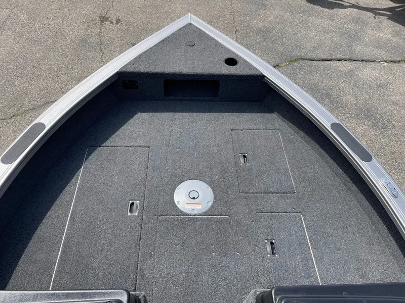 Slide: The Image of 2025 Crestliner 1750 Fish Hawk boat deck with storage compartments. - 15