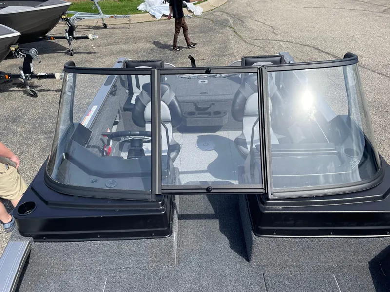 Slide: The Image of 2025 Crestliner 1750 Fish Hawk boat with dual consoles and seating, viewed from above. - 18