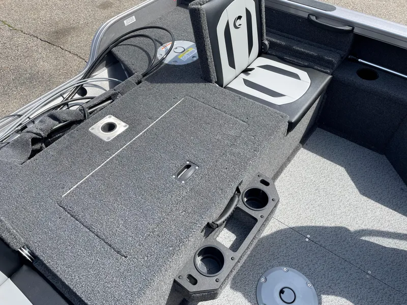 Slide: The Image of 2025 Crestliner 1750 Fish Hawk boat interior with seating and storage compartments. - 7