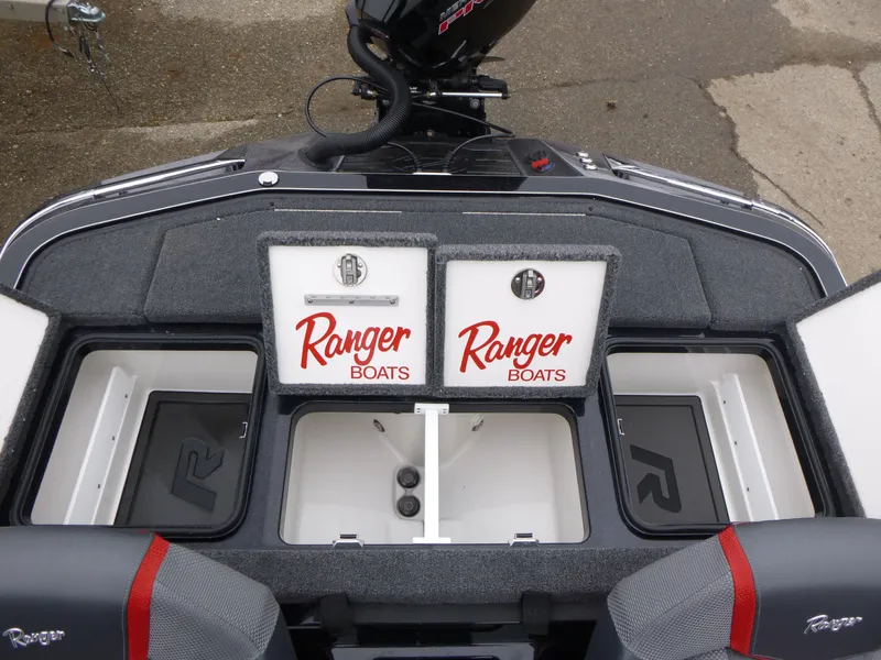 Slide: The Image of 2025 Ranger Z519R Cup-Equipped boat interior with storage compartments and branding. - 10