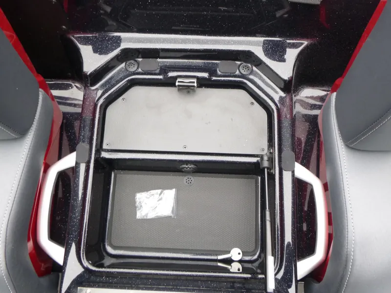 Slide: The Image of 2025 Ranger Z519R Cup-Equipped storage compartment with handles and keys, featuring sleek design. - 9