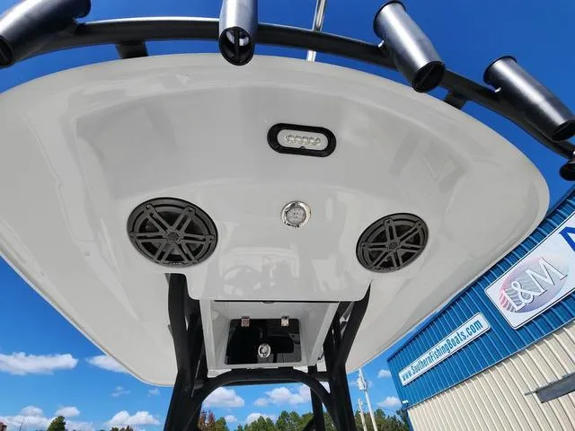 Slide: The Image of 2025 Pathfinder 2300 HPS boat with speakers and rod holders, viewed from below. - 22