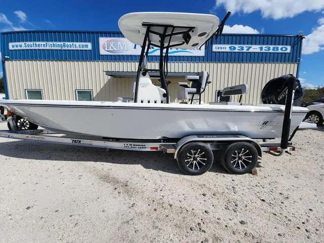 Slide: The Image of 2025 Pathfinder 2300 HPS boat on trailer, parked outside Southern Fishing Boats dealership. - 6
