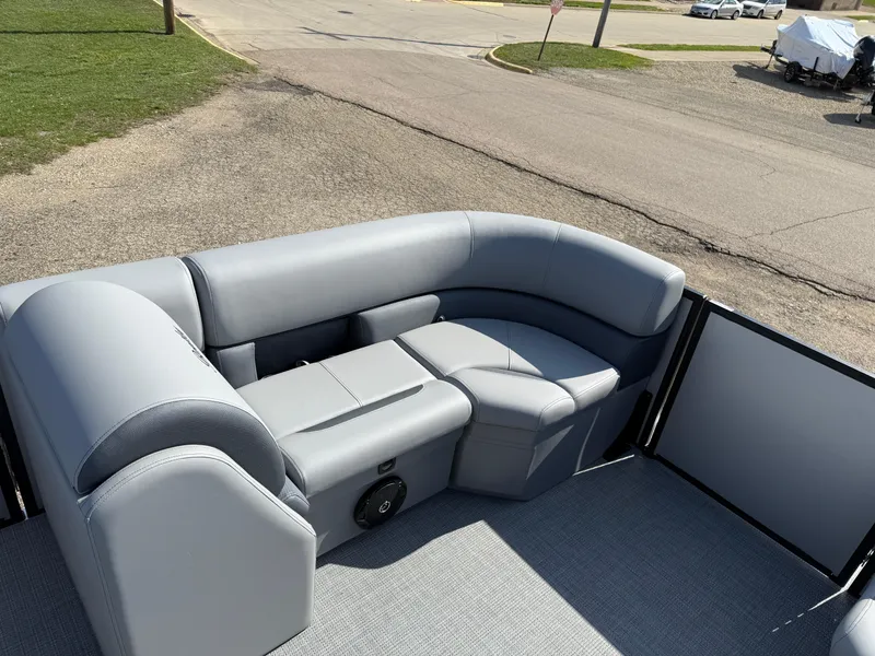 Slide: The Image of 2025 Bentley Pontoons LE 200 CW interior with gray seating and spacious layout. - 10