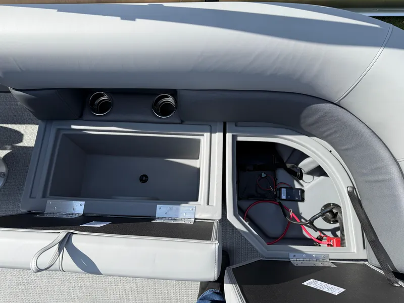 Slide: The Image of 2025 Bentley Pontoons LE 200 CW interior storage compartments and seating detail. - 18