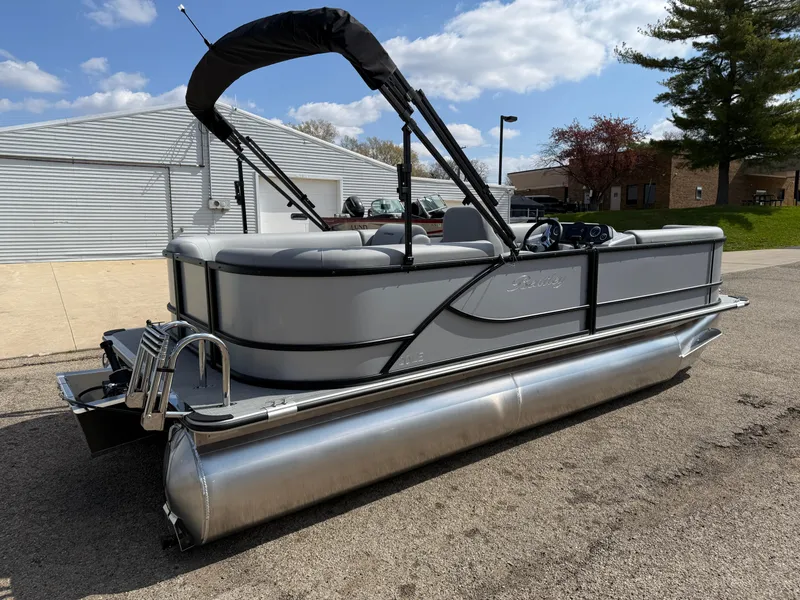 Slide: The Image of 2025 Bentley Pontoons LE 200 CW pontoon boat parked outdoors. - 5