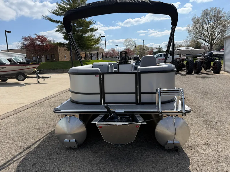 Slide: The Image of 2025 Bentley Pontoons LE 200 CW pontoon boat parked outdoors on a sunny day. - 6