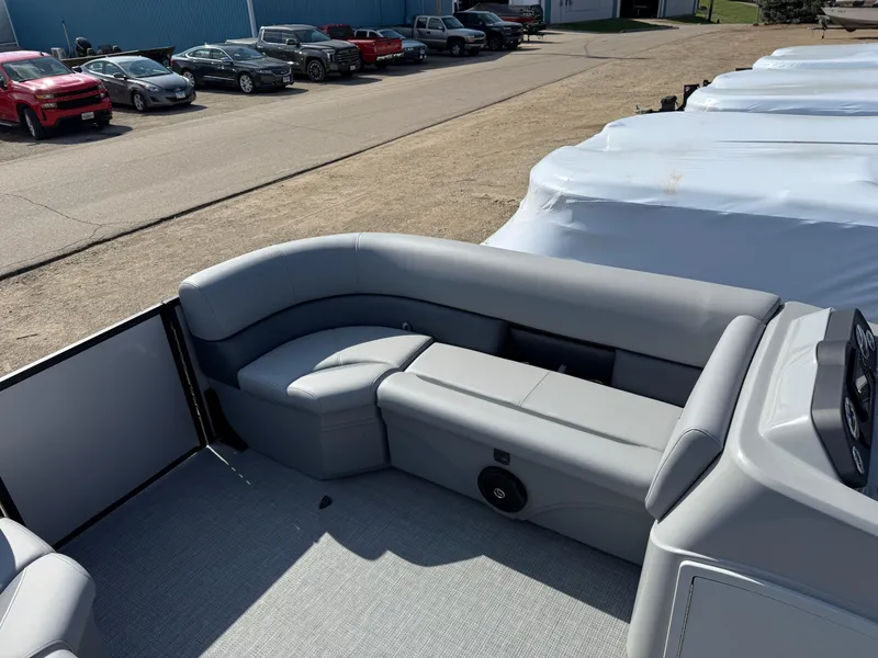 Slide: The Image of 2025 Bentley Pontoons LE 200 CW interior with gray seating and modern design. - 9