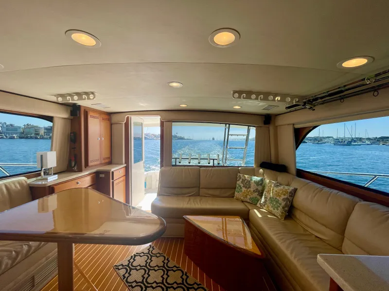 Slide: The Image of Luxurious interior of 2006 Cabo 40 Flybridge yacht with scenic ocean view. - 32
