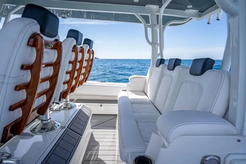 Slide: The Image of Interior of 2019 HCB 53 Sueños boat with luxurious seating and ocean view. - 16