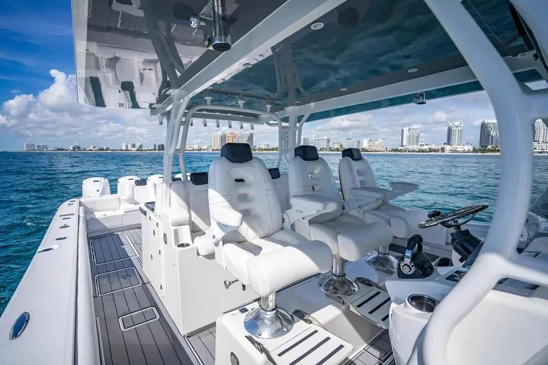 Slide: The Image of Luxurious 2019 HCB 53 Sueños boat interior with plush seating and ocean view. - 21