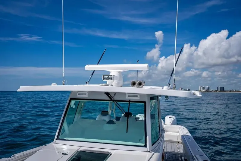 Slide: The Image of 2019 HCB 53 Sueños boat on open sea under clear blue sky. - 30