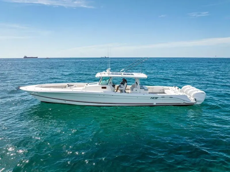 Slide: The Image of 2019 HCB 53 Sueños boat cruising on open blue ocean waters. - 4