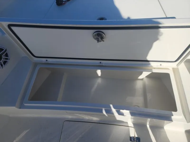 Slide: The Image of Open storage compartment on 2025 Pathfinder 2400 Open boat. - 11