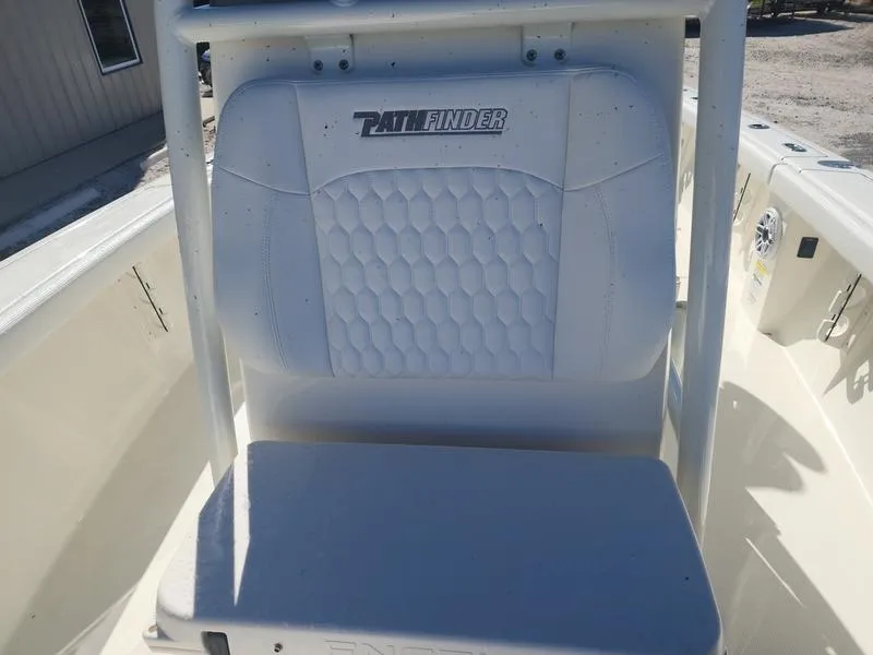Slide: The Image of 2025 Pathfinder 2400 Open boat seat with textured white upholstery. - 17